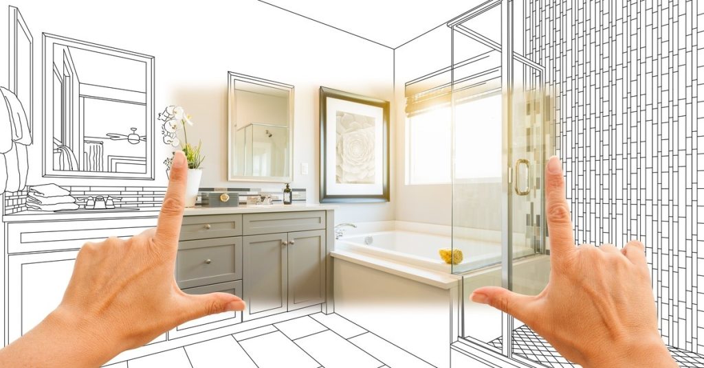 A bathroom is mostly in sketch, with two hands creating a frame with their fingers. The bathroom has color inside the finger frame.